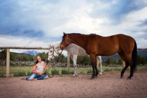 Girl and her horses with Mount Sopris